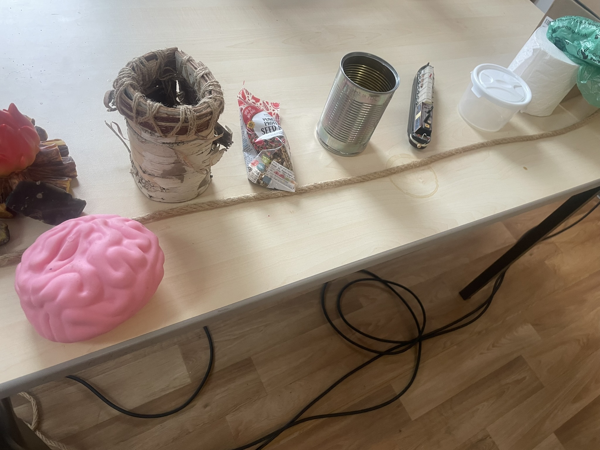 Hoarding workshop objects and learning materials arranged on a table